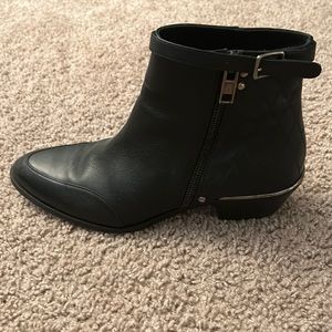 Chloe black pointer toe boots with clasp and zipper. Size 38.5 or 8.5.